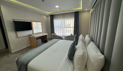 Double room with side sea view