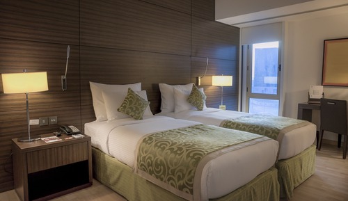 Two Bed Family Suite with Separate living area and Dining Area