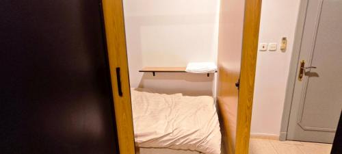 Single Bed in Female Dormitory Room