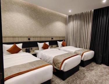 Deluxe Triple Room