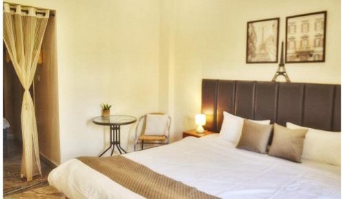 One-Bedroom Apartment with Balcony and City View